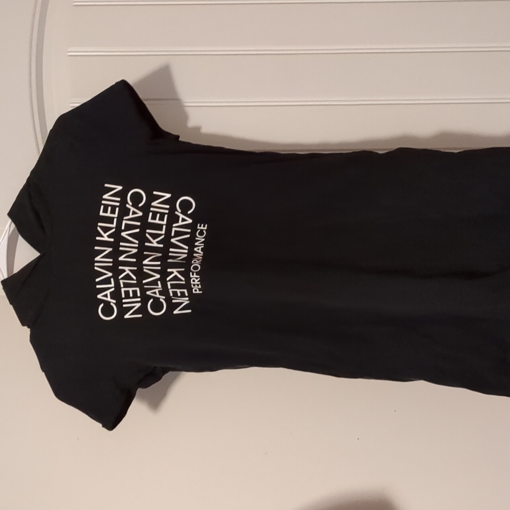 Girl's Calvin Klein dress with front pockets and hoodie. Size L (12-14)